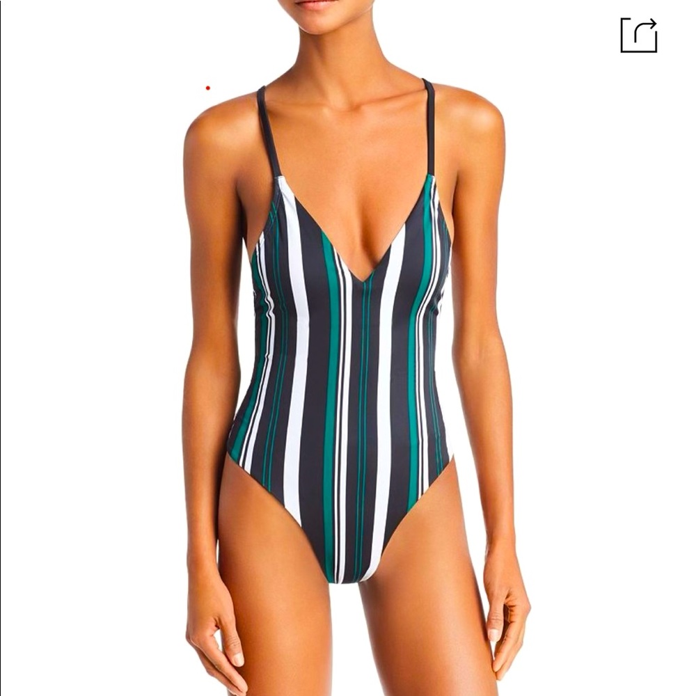 Ladies Dolce Vita swim suit. New w/ tags sleek 1PC slim fit High Cut Fit